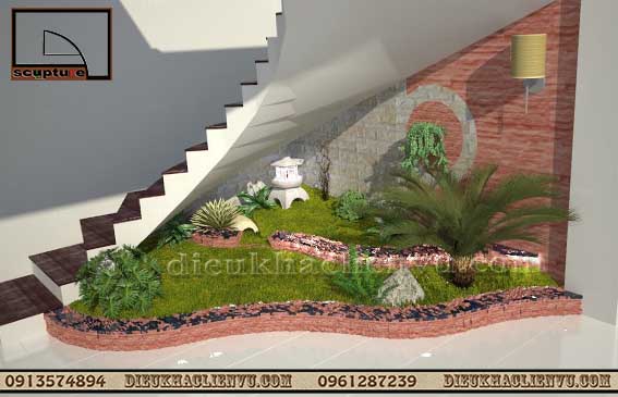 Thi công tiểu cảnh đơn giản với cây xanh và đá sỏi cho gầm cầu thang